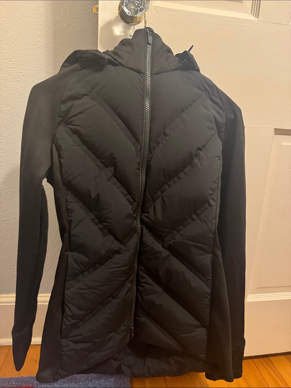 Athleta Black Quilted Hybrid Puffer Jacket with Stretch Knit Sleeves